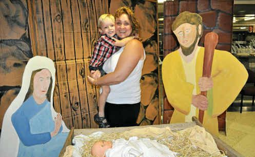 Joey, 3, and Jenni Hill pose in the Nativity scene. Joey, 3, and Jenni Hill pose in the Nativity scene.